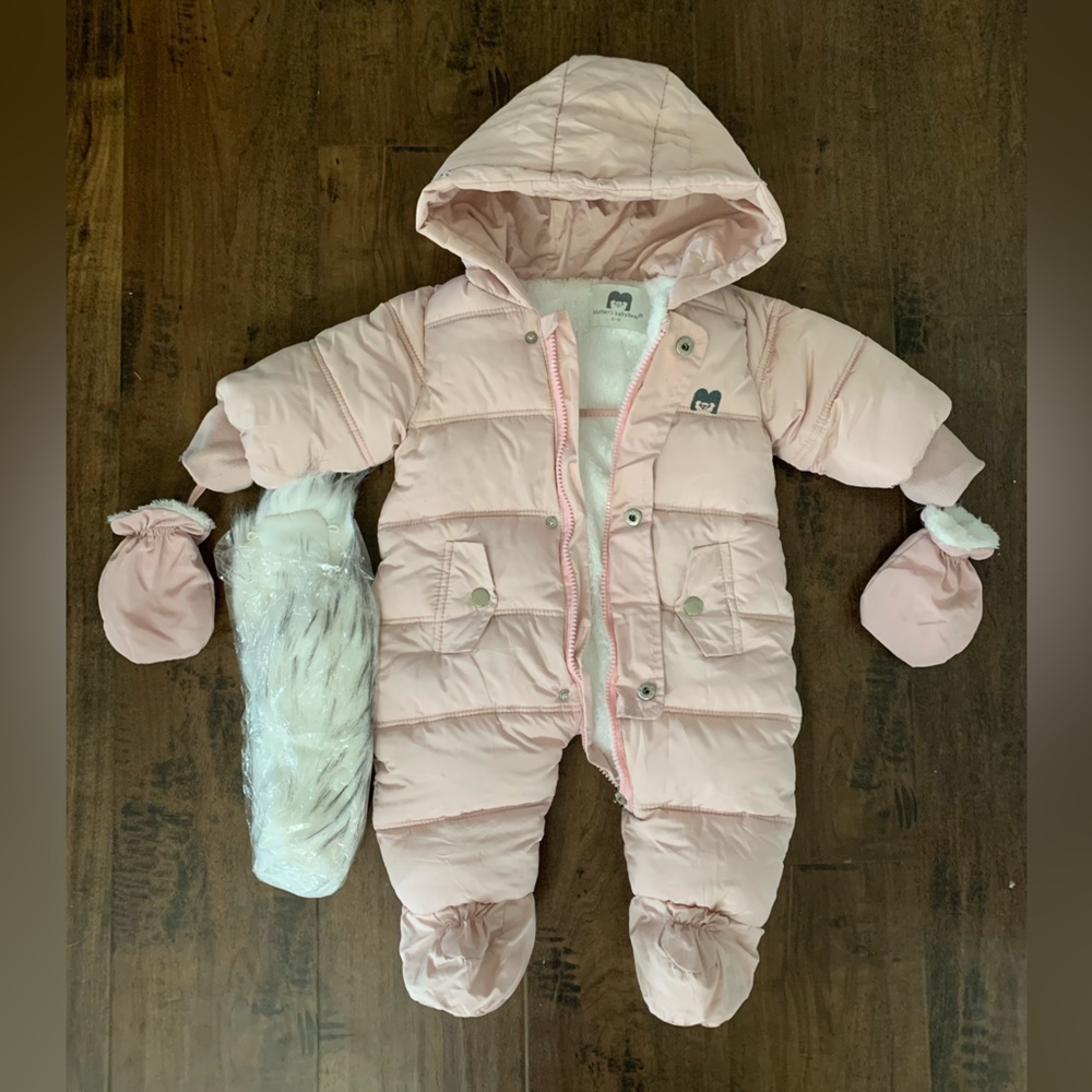 Baby snow suit 6-9 months Pink outside, white faux fur lining.